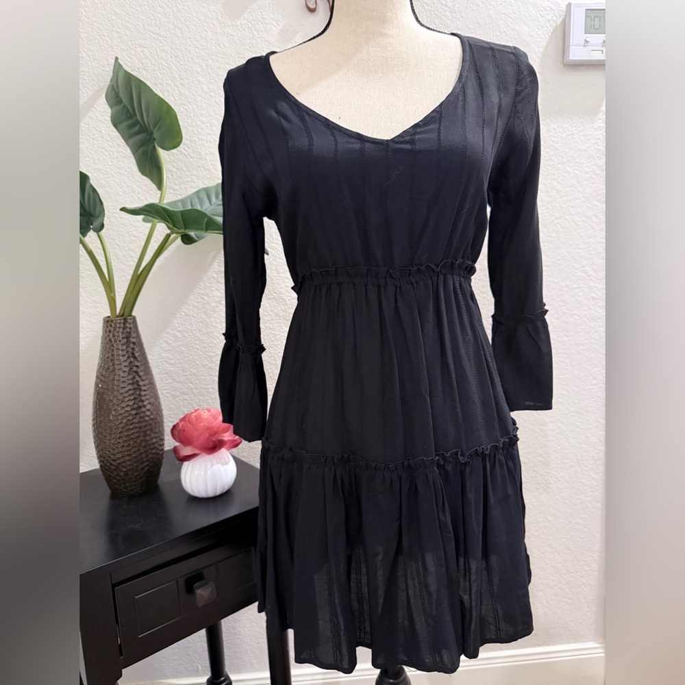 Women’s XS black mini dress with v-neck by Tilly’s. New with tags!!